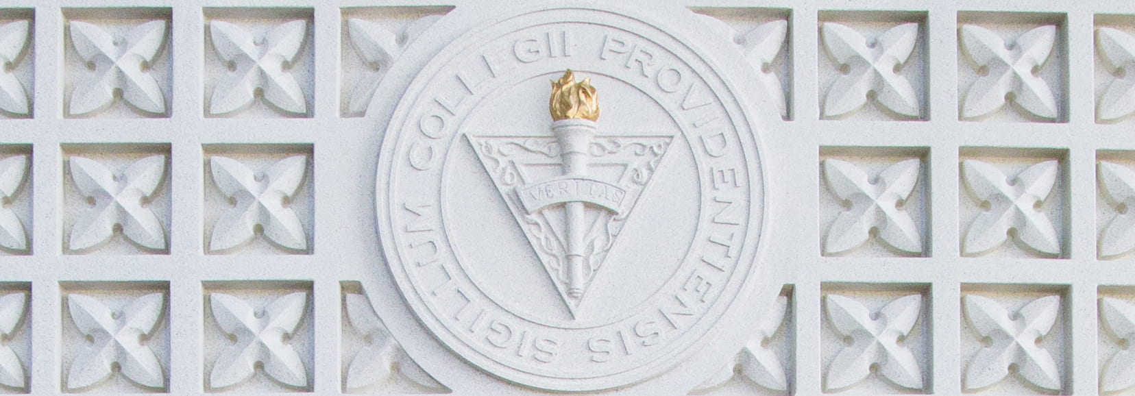 Ruane Seal, white cement with VERITAS logo